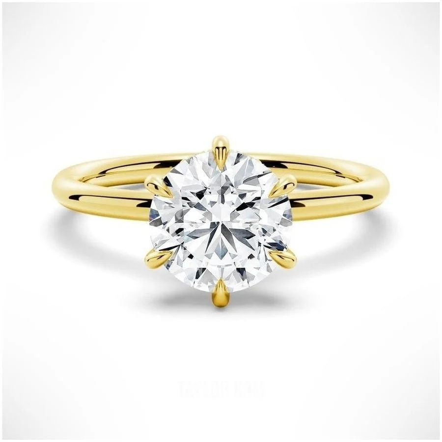Six-Prong Solitaire Round Cut Engagement Ring With Hidden Halo