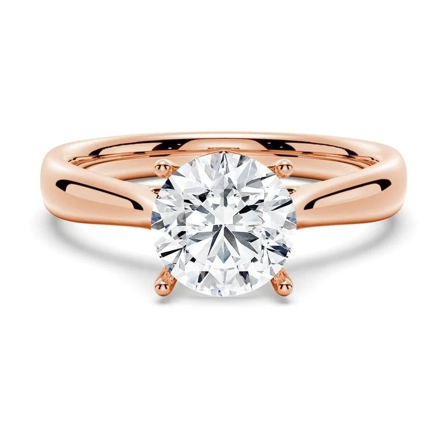 Classic 4-Prong Solitaire Round Moissanite Ring
