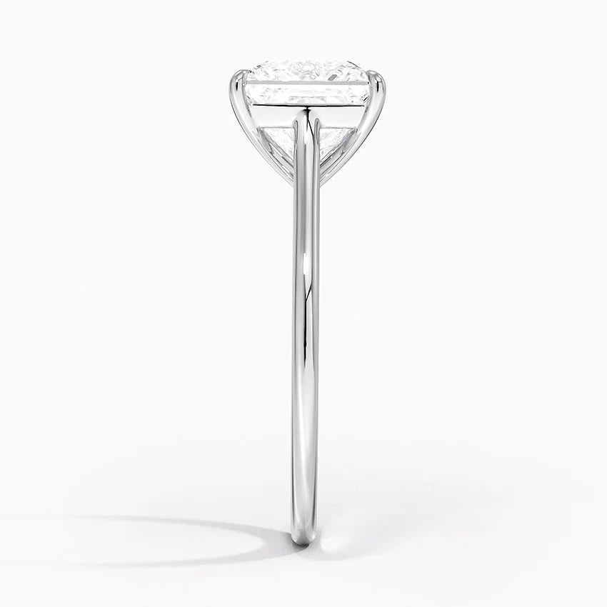 Petite Four Prong Solitaire Princess Moissanite Ring