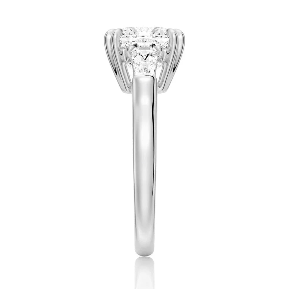 Elegant Cushion Cut Ring with Side Stones