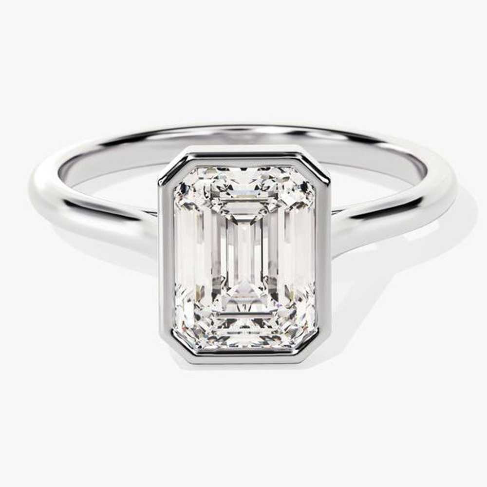 Emerald Engagement Ring with Hidden Halo