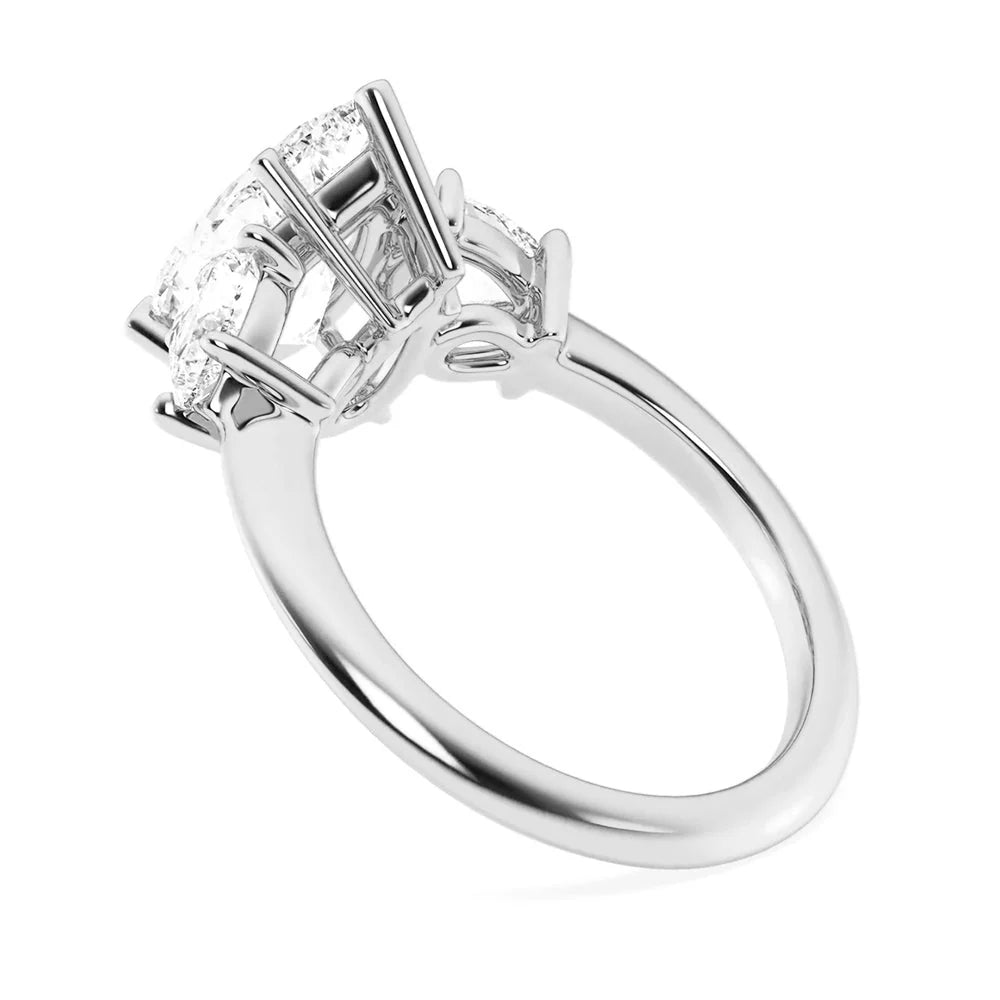 Three Stone Pear Moissanite Ring in Platinum Finish